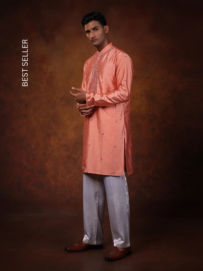CORAL PINK MINIMALISTIC PITTA WORK KURTA WITH OFF WHITE STRAIGHT PANT